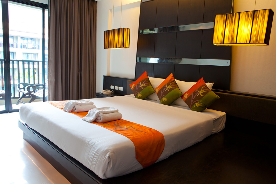 photodune-2232283-hotel-room-with-bed-and-wooden-m