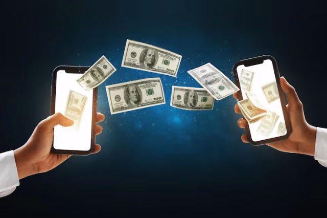 businessman-hand-transfer-money-using-mobile-phone_1024307-5729